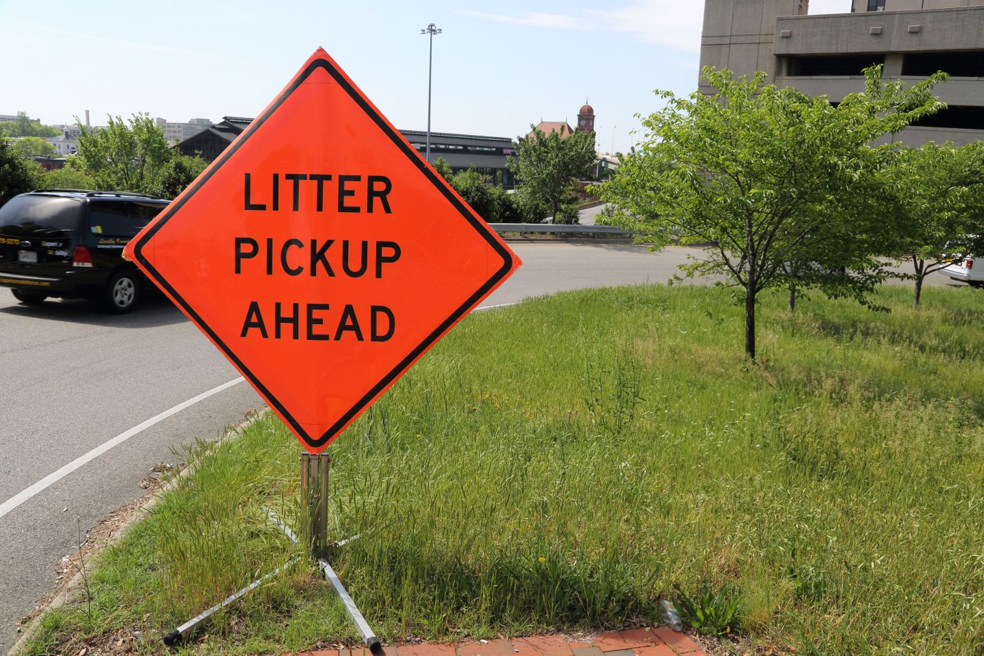 Litter pickup ahead sign