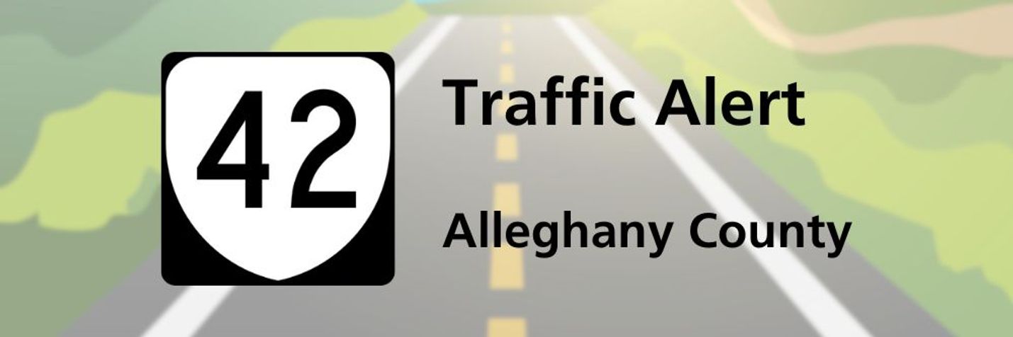 Informational graphic with a Route 42 shield and the words, Traffic Alert - Alleghany County. The background is a stylized image of a two-lane roadway extending to the horizon with grass and trees on both sides.