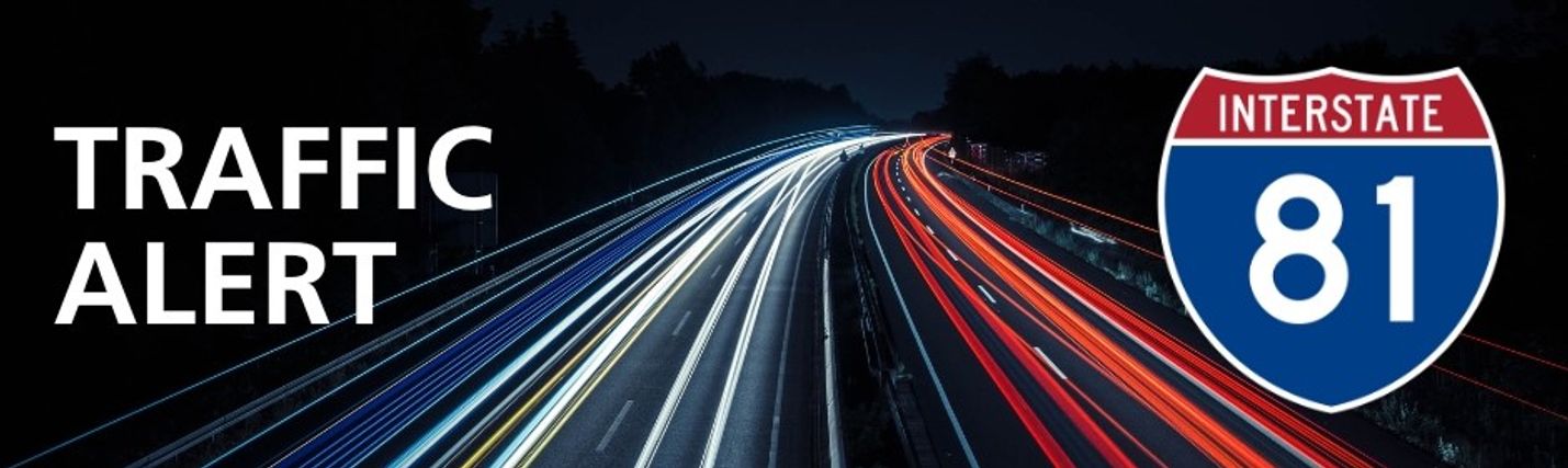 Blurry image of traffic along I-81 at night