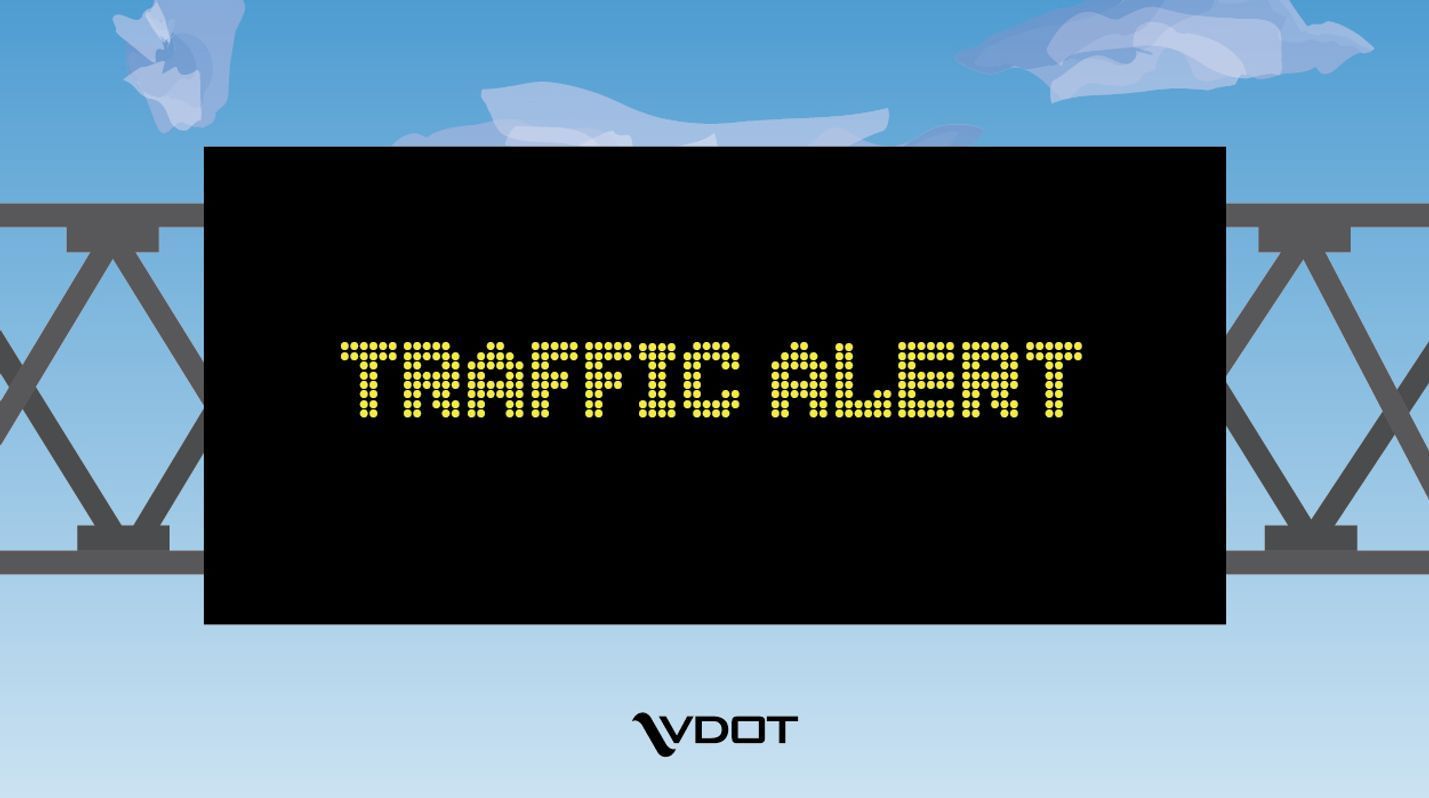 Digital message sign with the words Traffic Alert