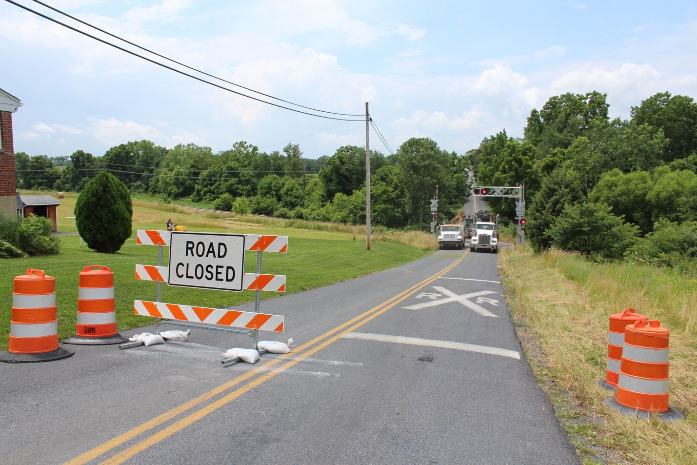 Railroad Crossing Work with Trucks