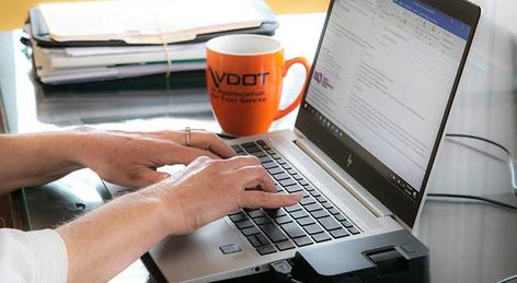 laptop and VDOT mug